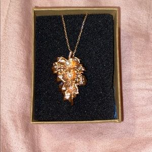 gold leaf with pearl necklace